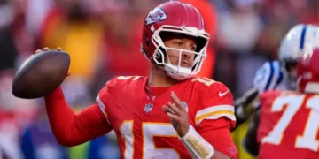 Kansas City Chiefs celebrate overtime field goal against Indianapolis Colts. - AP Photo/Charlie Riedel