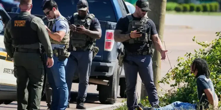 Memphis police and federal officers conduct street operations amid rising arrests - AP Photo/George Walker IV, File