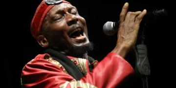 Jimmy Cliff performing on stage, reggae legend in concert, 2022 - AP Photo/Wong Maye-E, File