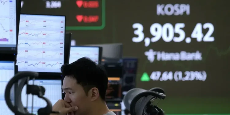 Traders monitor screens as Wall Street winning streak extends - AP Photo/Ahn Young-joon