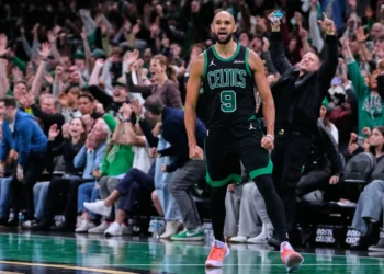 Boston Celtics players celebrate win over Detroit Pistons - AP Photo/Charles Krupa