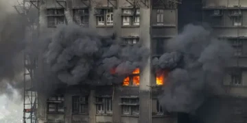 Firefighters battle massive blaze in Hong Kong high-rise complex - AP Photo/Chan Long Hei