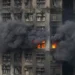 Firefighters battle massive blaze in Hong Kong high-rise complex - AP Photo/Chan Long Hei