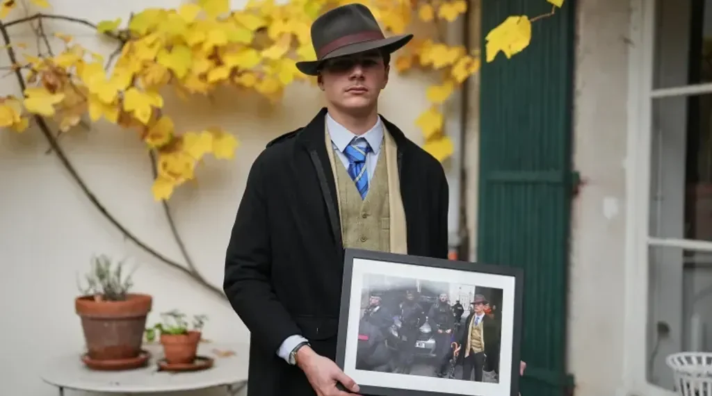 Teen Behind Louvre Viral “Fedora Man” Photo Reveals His Story and Style - AP Photo/Thibault Camus