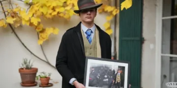 Teen Behind Louvre Viral “Fedora Man” Photo Reveals His Story and Style - AP Photo/Thibault Camus