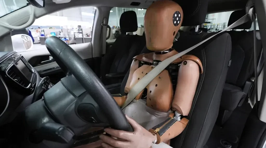 U.S. Endorses Lifelike Female Crash Test Dummy to Improve Car Safety Ratings and Reduce Injury Risks for Women Drivers - AP Photo/Paul Sancya, File