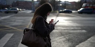 Russia cellphone internet outages disrupt daily life, prompt public frustration and questions over government restrictions - AP Photo/ Alexander Zemilianichenko