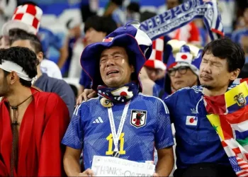 Fans react to high World Cup 2026 ticket prices outside a football stadium - John Sibley/Reuters/CNN