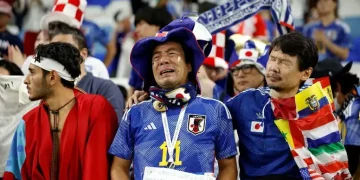 Fans react to high World Cup 2026 ticket prices outside a football stadium - John Sibley/Reuters/CNN