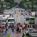 Venezuelans walking in Caracas during rising tensions and growing national anxiety - Gaby Oraa/Reuters/CNN