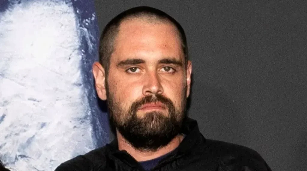 Los Angeles police near the Reiner family residence during investigation. - Aude Guerrucci/Reuters/File