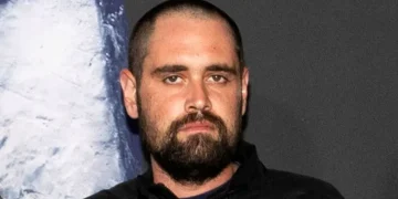 Los Angeles police near the Reiner family residence during investigation. - Aude Guerrucci/Reuters/File