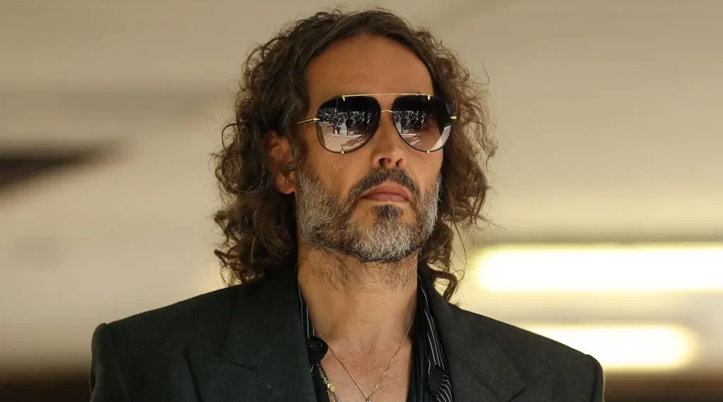 Russell Brand at public event amid UK criminal proceedings - Reuters/BBC