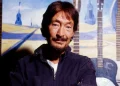 Chris Rea performing on stage during a live concert - Chris Rea pictured in his studio in 2005/Getty Images/BBC