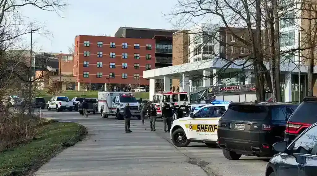 Police vehicles outside Kentucky State University dorm after campus shooting - Hannah Brown/The State Journal via AP
