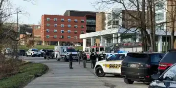 Police vehicles outside Kentucky State University dorm after campus shooting - Hannah Brown/The State Journal via AP