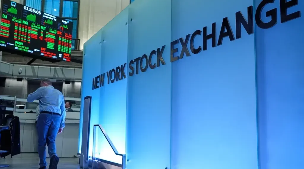 Wall Street street sign near New York Stock Exchange - AP Photo/Seth Wenig