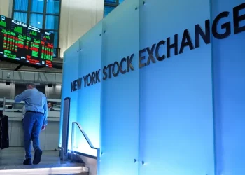 Wall Street street sign near New York Stock Exchange - AP Photo/Seth Wenig