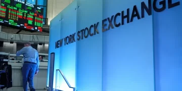 Wall Street street sign near New York Stock Exchange - AP Photo/Seth Wenig