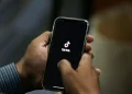 TikTok logo with Oracle partnership announcement in U.S. deal - AP Photo/Anjum Naveed, File
