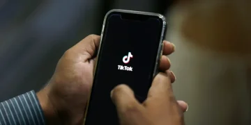 TikTok logo with Oracle partnership announcement in U.S. deal - AP Photo/Anjum Naveed, File