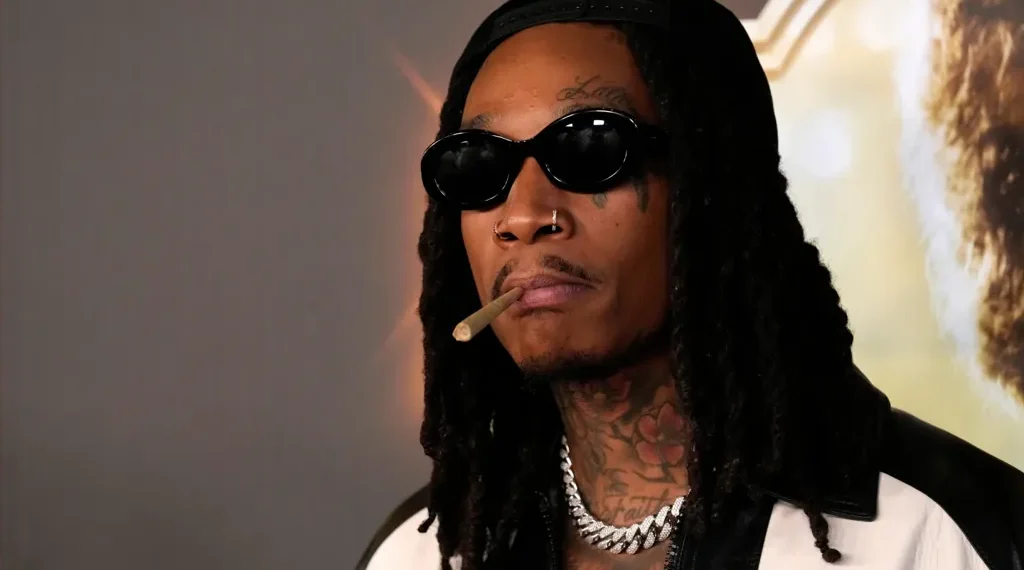 Wiz Khalifa performing onstage at a European music festival - AP Photo/Chris Pizzello, File