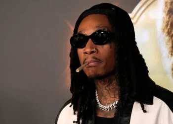 Wiz Khalifa performing onstage at a European music festival - AP Photo/Chris Pizzello, File