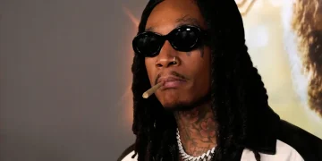 Wiz Khalifa performing onstage at a European music festival - AP Photo/Chris Pizzello, File