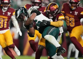 Eagles and Commanders players scuffle after late fourth-quarter play - AP Photo/Stephanie Scarbrough