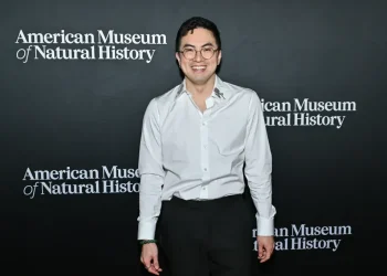 Bowen Yang appearing on Saturday Night Live stage - Photo by Evan Agostini/Invision/AP, File