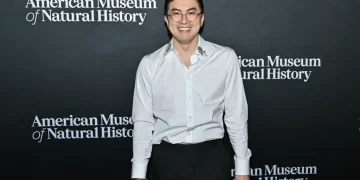 Bowen Yang appearing on Saturday Night Live stage - Photo by Evan Agostini/Invision/AP, File