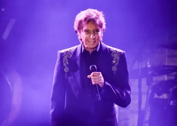 Barry Manilow performing during a recent concert appearance - Photo by Richard Shotwell/Invision/AP, File