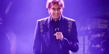 Barry Manilow performing during a recent concert appearance - Photo by Richard Shotwell/Invision/AP, File