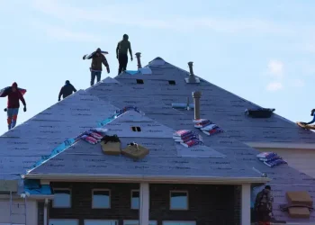 US Capitol and financial district reflecting economic growth data - AP Photo/LM Otero