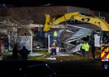 Fire crews at Pennsylvania nursing home explosion site - Monica Herndon/The Philadelphia Inquirer via AP