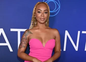 Mickey Lee Big Brother contestant smiling during television appearance - Paras Griffin / Getty Images/CBSNEWS