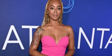 Mickey Lee Big Brother contestant smiling during television appearance - Paras Griffin / Getty Images/CBSNEWS