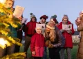 People singing together in a group demonstrating health benefits - Getty Images/BBC