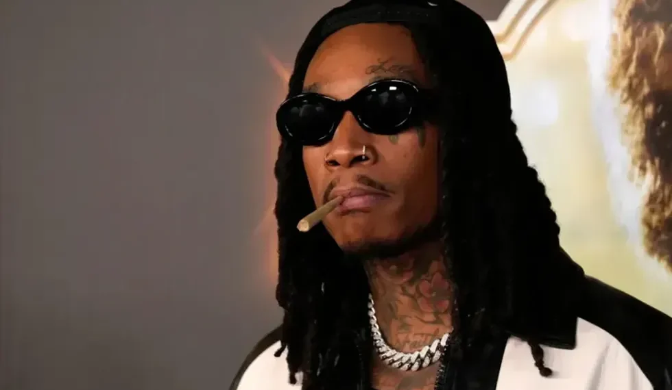 Wiz Khalifa performing on stage at international music festival - Matt Jelonek/Getty Images