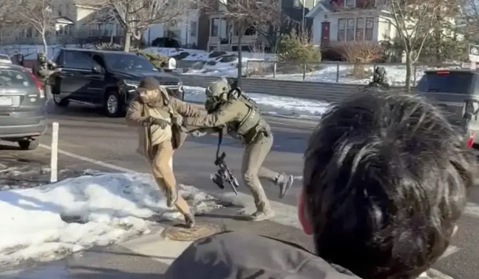 Alex Pretti confronting federal officers during Minneapolis protest - Max Shapiro via AP