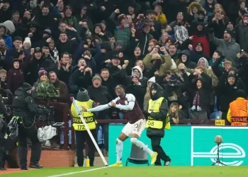 Aston Villa players celebrate late Europa League winner at Villa Park - Nick Potts/PA via AP