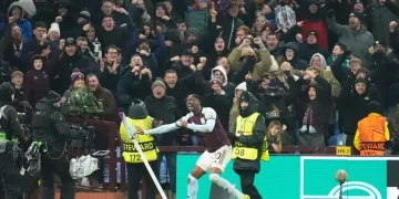 Aston Villa players celebrate late Europa League winner at Villa Park - Nick Potts/PA via AP