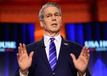 U.S. Treasury Secretary Bessent and Canadian PM Carney discuss trade tensions - AP Photo/Markus Schreiber