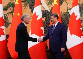 Canada and China agree on electric vehicle and farm trade tariffs - Sean Kilpatrick/The Canadian Press via AP