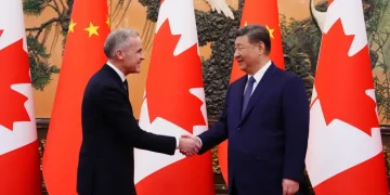 Canada and China agree on electric vehicle and farm trade tariffs - Sean Kilpatrick/The Canadian Press via AP