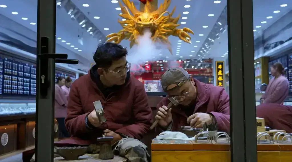 Chinese cargo ships at port reflecting China economy growth in 2025 - AP Photo/Ng Han Guan