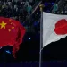Chinese and Japanese flags amid diplomatic and trade tensions - AP Photo/Eugene Hoshiko, File