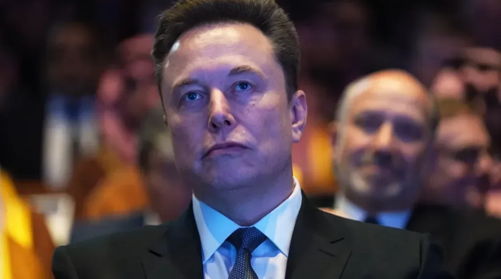 Grok chatbot logo amid controversy over AI-generated deepfake images - AP Photo/Evan Vucci