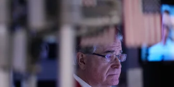 Wall Street traders as U.S. stocks reach record highs - AP Photo/Seth Wenig