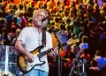 Bob Weir performing onstage with guitar during later career - Photo By Amy Harris/Invasion/AP,File
